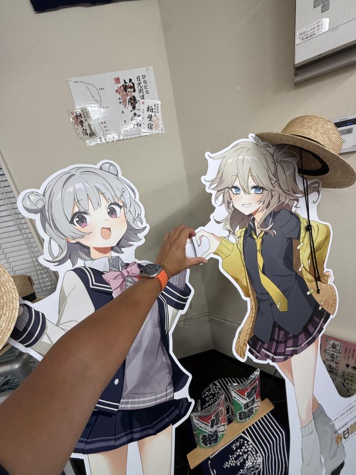 帽子姿の二人とハート
